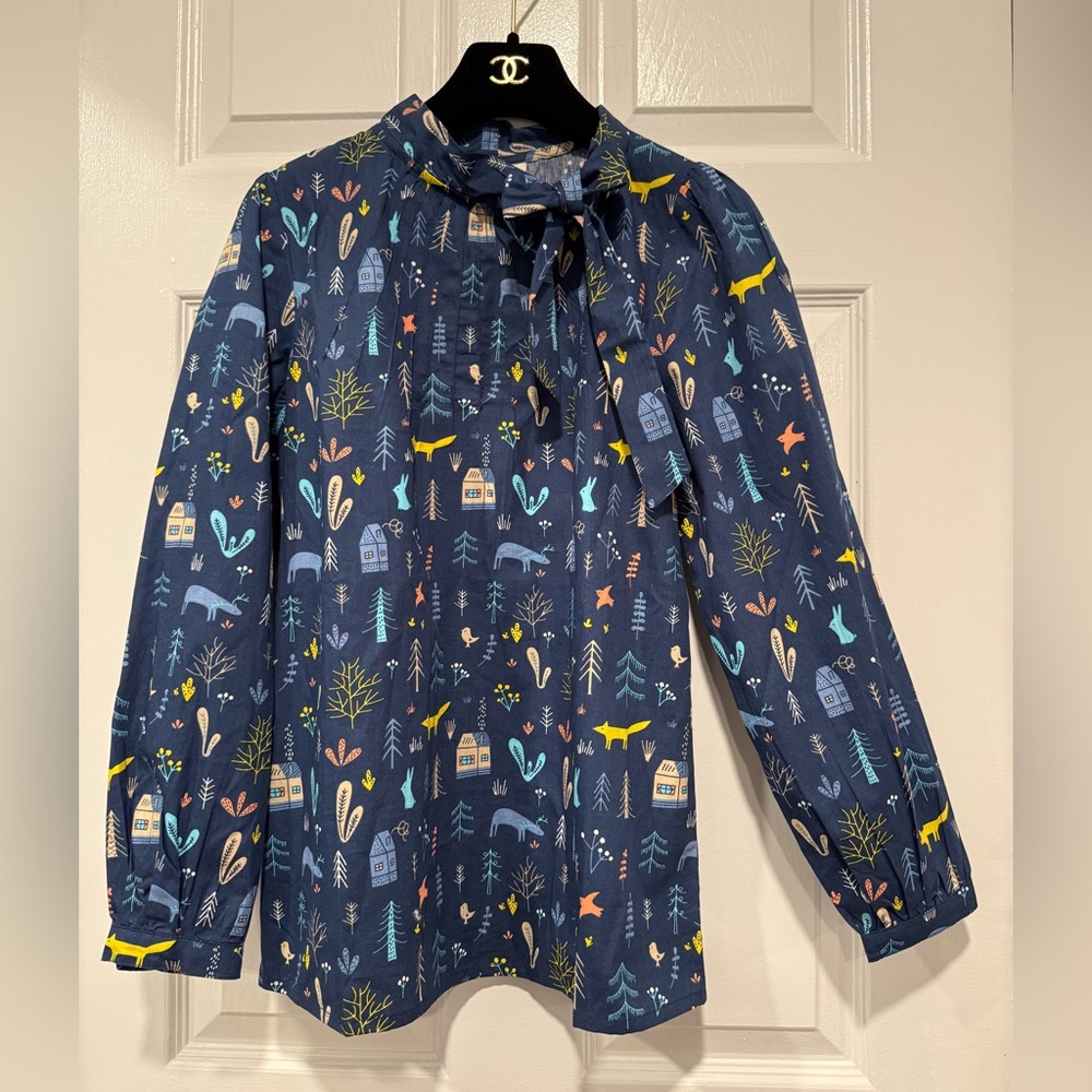 Circus by Sam Edelman blouse with a pussybow tie & whimsical nature themed print